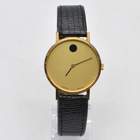 THE GOLDEN SPLENDOR OF THE TIME: BUCHERER TABLE CLOCK WITH SWIZA