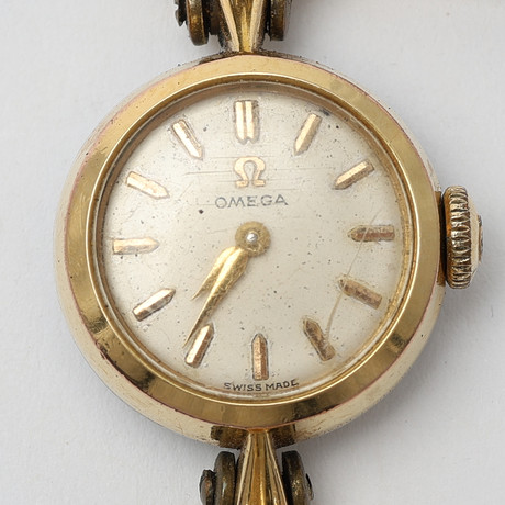 OMEGA, damarmbandsur, guld på stål.