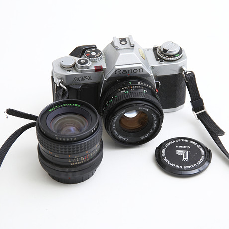 Canon F1 35mm camera (SN 237078) with two lenses. Photo, Cameras