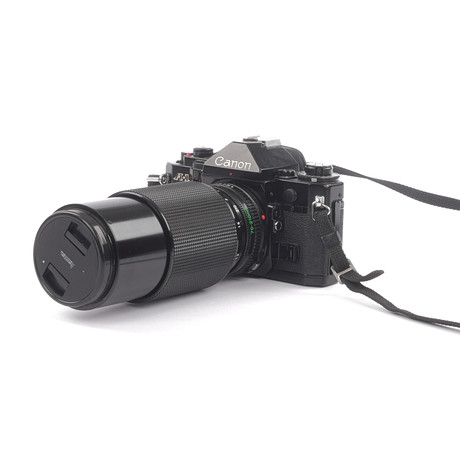 Una cámara Canon AV-1 de los años 70 y 80. Fotografía, cámaras y