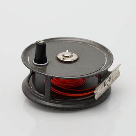 A fishing reel and fishing rod with accessories, Abu-matic 160 and