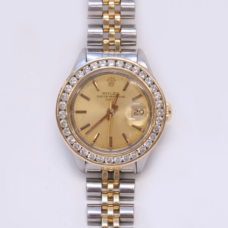 DAMARMBANDSUR, ROLEX, OYSTER PERPETUAL, DATE. på auktion hos Björnssons Auktionskammare