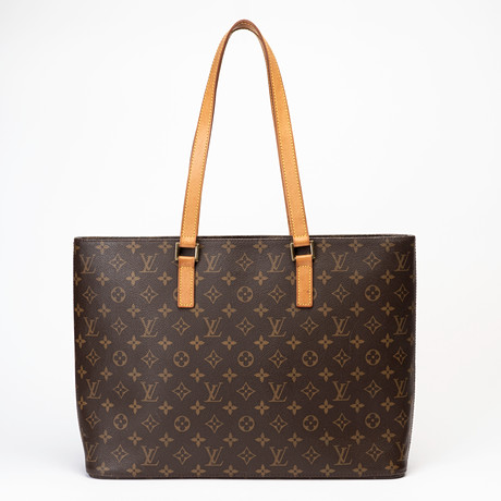 LOUIS VUITTON. Väska, "Luco" tote bag, monogramcanvas, detaljer i läder och guldfärgad metall, Paris, Frankrik på auktion hos Auktionshuset Kolonn