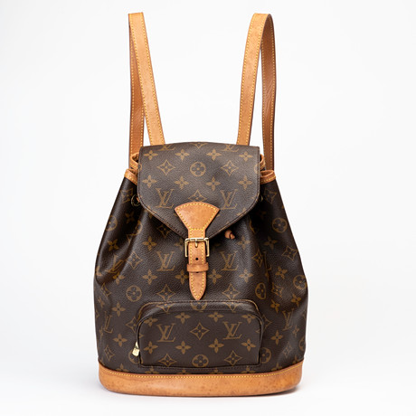 LOUIS VUITTON. Ryggsäck, "Mountsouris", monogramcanvas, detaljer i läder samt guldfärgad metall, Paris, Frankr på auktion hos Auktionshuset Kolonn