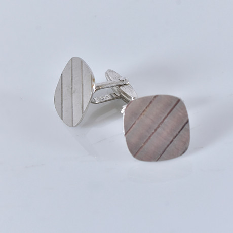 MANSCHETTKNAPPAR, sterlingsilver. på auktion hos Halmstads Auktionskammare