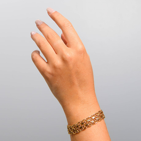 ARMBAND, 18k guld, X-länk, Stockholms Ädelsmide Ab, Solna, 1968. på auktion hos Formstad Auktioner