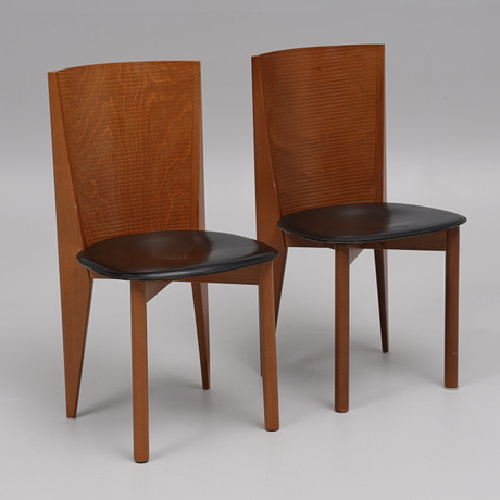 A pair of “Cicladi” chairs, leather and steel, Calligaris, Italy