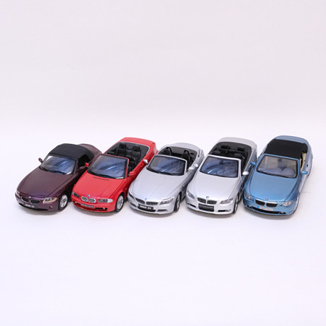 KYOSHO. FEM MODELLBILAR, "BMW". SKALA 1:18.