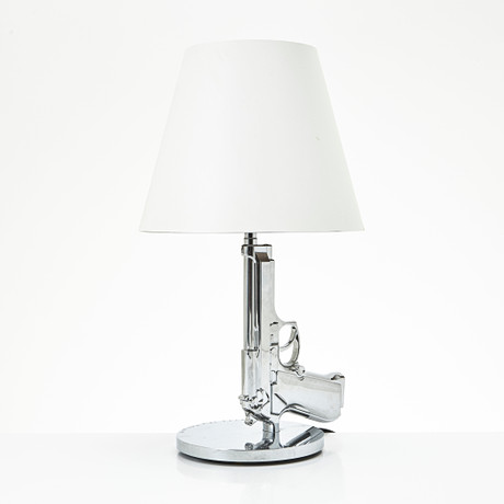 PHILIPPE STARCK. bordslampa, "Table Gun", Flos, samtida. på auktion hos Stockholms Auktionsverk Magasin 5