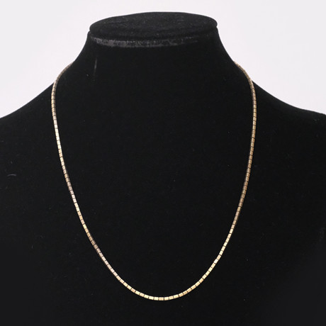 COLLIER, 18K GULD. på auktion hos Björnssons Auktionskammare