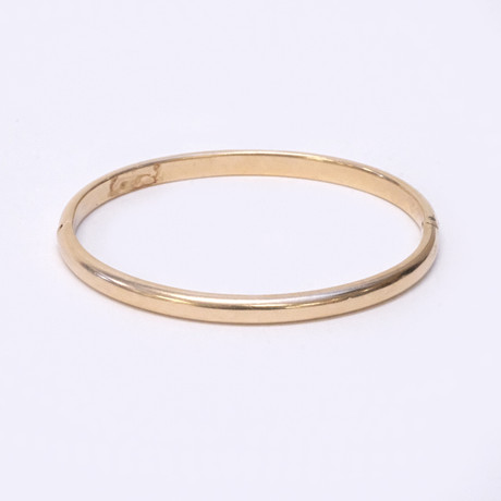 ARMRING, 18K GULD. på auktion hos Björnssons Auktionskammare