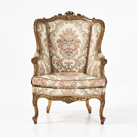BERGÈRE, Louis XV-stil, 1900-taletsförsta hälft, skuren dekor, förgylld. på auktion hos Stockholms Auktionsverk Magasin 5