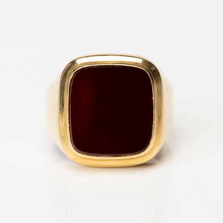 RING, guld, 18K samt röd sten, svensk importstämpel. på auktion hos Auktionshuset Kolonn