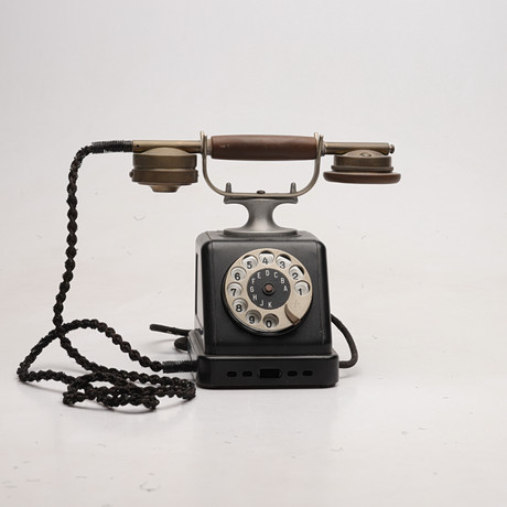 A desk phone, “No.1904