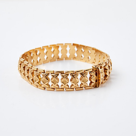 ARMBAND, 18 k guld, fantasilänk med genombruten dekor, Vicenza, Italien. på auktion hos Stockholms Auktionsverk Sickla