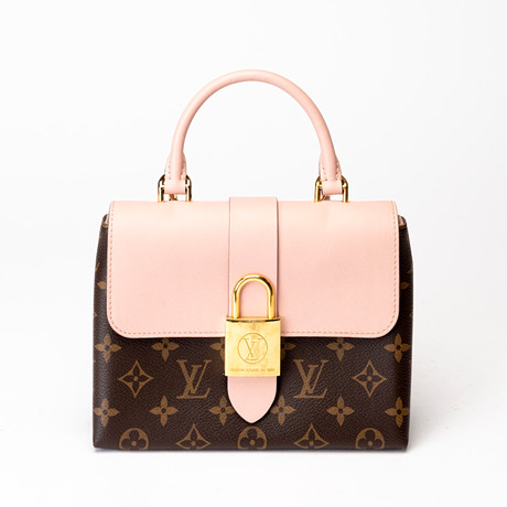 LOUISE VUITTON. Handväska, monogramcanvas och rosa läder, "Locky BB". Paris, Frankrike. på auktion hos Auktionshuset Kolonn