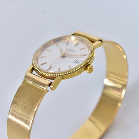 DAMARMBANDSUR, Tissot, 18K.