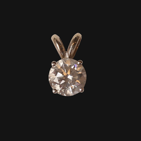 HÄNGE 18K GULD MED DIAMANT 1,07 CT. Certifikat från AIG medföljer. på auktion hos Limhamns Auktionsbyrå