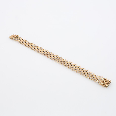 ARMBAND, 18 K GULD, x-länk, 29,7 g. på auktion hos Crafoord Auktioner Lund