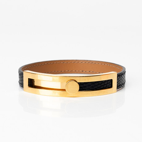 HERMÈS. Armband, läder och guldplätterad metall, "Pousse-Pousse", Paris, Frankrike. på auktion hos Auktionshuset Kolonn