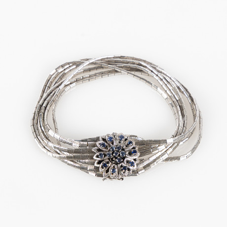 ARMBAND, 18K vitguld och fasettslipade safirer, Vicenza, Italien. på auktion hos Stockholms Auktionsverk Helsingborg