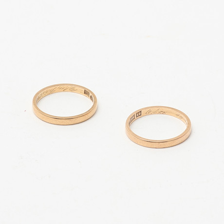 RINGAR, två stycken, guld 18K. på auktion hos Uppsala Auktionskammare