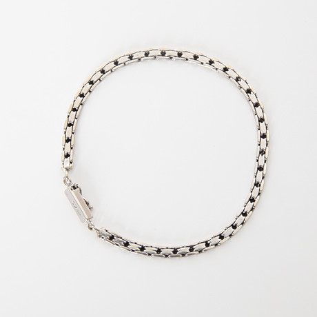 ARMBAND, 18K vitguld, Uno A Erre, Italien. på auktion hos Auktionsverket Engelholm