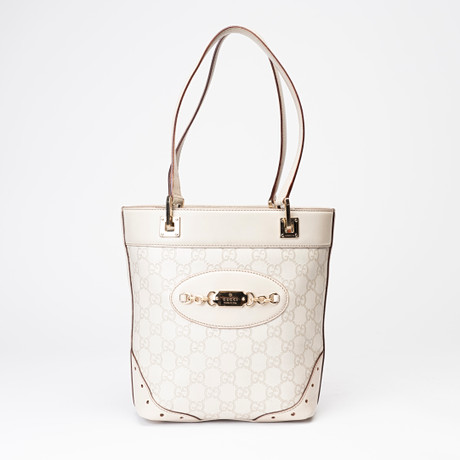 GUCCI. Handväska, "Gucci Guccissima Punch Tote", design Frida Giannini omkring 2004/2005. på auktion hos Auktionshuset Kolonn