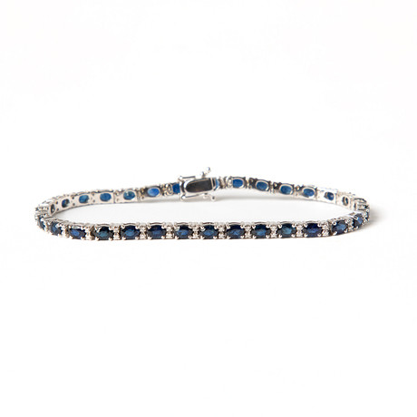 ARMBAND, 18K vitguld med ovalslipade safirer, totalt ca 11.0 ct samt briljantslipade diamanter, totalt ca 0.50 på auktion hos Stockholms Auktionsverk Göteborg