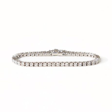 ARMBAND, sk tennisarmband, 18K vitguld med briljantslipade diamanter totalt ca 4.40 ct. på auktion hos Stockholms Auktionsverk Göteborg