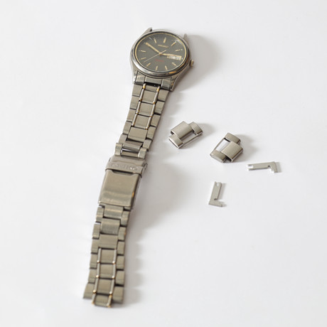 ARMBANDSUR, stål, Seiko Titanium. på auktion hos Gomér & Andersson Nyköping