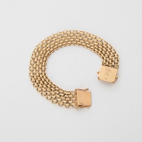 ARMBAND, 5-radig x-länk, 18K guld, 1969. på auktion hos Auktionsverket Engelholm