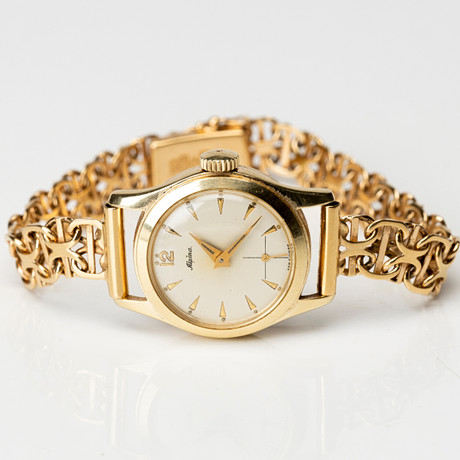 ALPINA, armbandsur, manuell, cal. 566, boett av 14K samt länk av 18K guld, 1900-talets andra hälft. på auktion hos Auktionshuset Kolonn