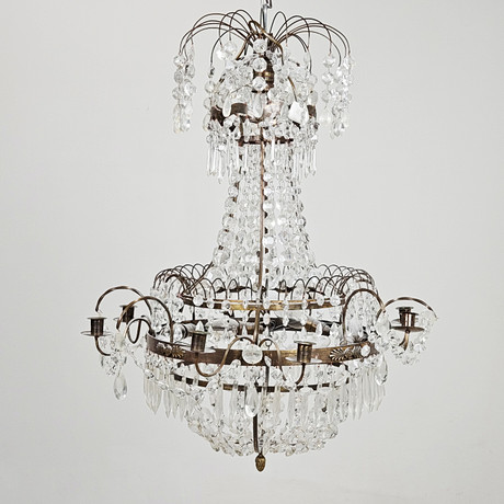LJUSKRONA, empirstil, 1900-talets första hälft, höjd ca. 76 cm. på auktion hos Auktionshuset Thörner & Ek