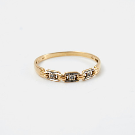 RING, 18 k guld, 3 briljantslipade diamanter, totalt ca 0,015 ct, GFAB. på auktion hos Stockholms Auktionsverk Sickla
