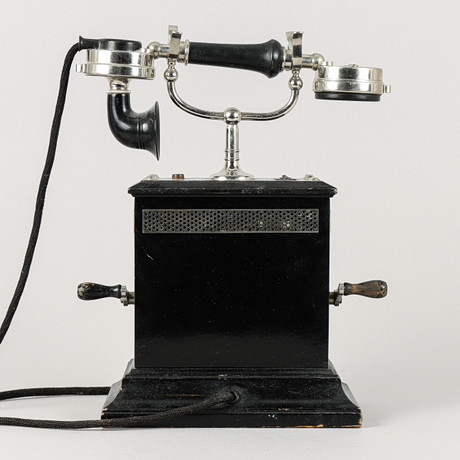 A desk phone, “No.1904
