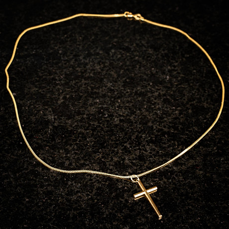 COLLIER, Guld 18k, Kors, Italien. på auktion hos Norrlands Auktionsverk