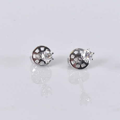 ENSTENSÖRHÄNGEN, 0,17ct, vitguld 18K. på auktion hos Halmstads Auktionskammare