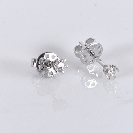 ENSTENSÖRHÄNGEN, 0,17ct, vitguld 18K. på auktion hos Halmstads Auktionskammare
