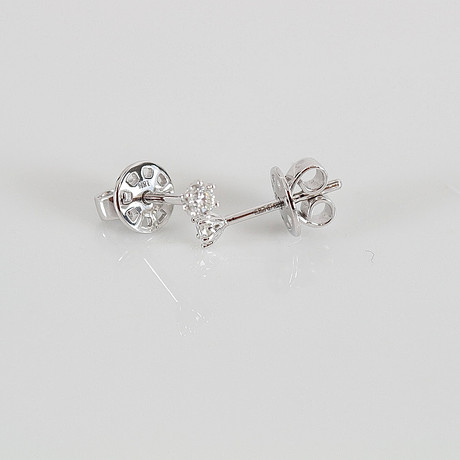 ENSTENSÖRHÄNGEN, 0,16ct, vitguld 18K. på auktion hos Halmstads Auktionskammare