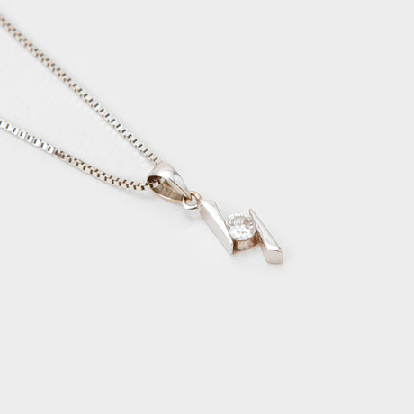 HÄNGE med KEDJA, 18k vitguld briljantslipad diamant 0,16ct, vikt ca 4,8 gram. på auktion hos Göteborgs Auktionsverk