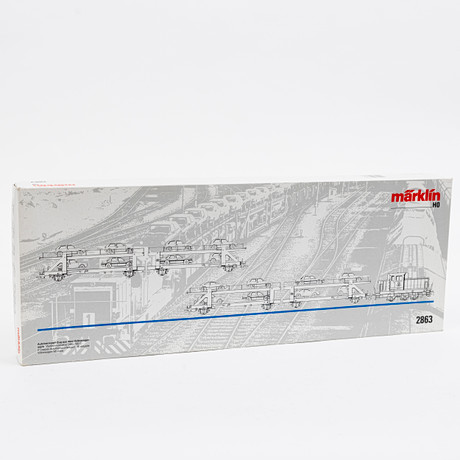 MÄRKLIN 2863 tågsats med litet diesellok, 2 biltransportvagnar och 16 tillhörande bilar märkta Herpa. instrukt på auktion hos Auktionshuset Kolonn