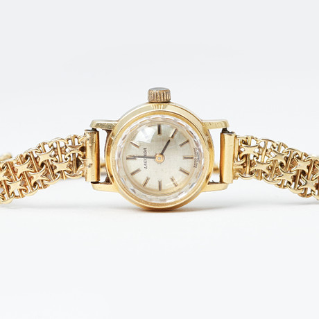 ARMBANDSUR, Lagonda, 18k guld, manuell, totalvikt ca 23,7 gram. på auktion hos Göteborgs Auktionsverk