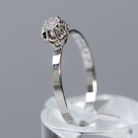 RING, 18K guld & 0,03ct diamant, storlek 17.5. på auktion hos Formstad Auktioner