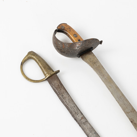 HUGGARE, två st, bland annat m/1851, GE Svalling Rosenfors, 1800-tal. på auktion hos Stockholms Auktionsverk Helsingborg