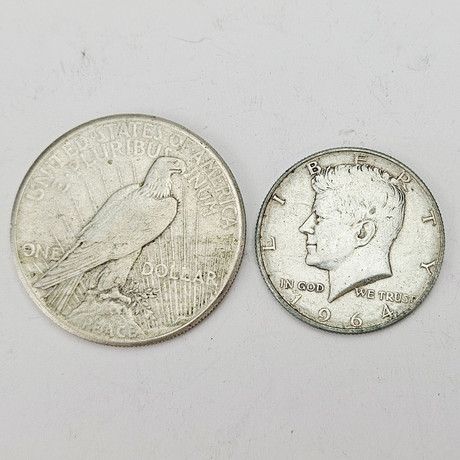 MYNT, 2 st, silverhalt 90 %, USA 1922-1964. på auktion hos Auktionshuset Thörner & Ek