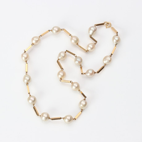 PÄRLCOLLIER. 18k guld med odlade pärlor, totalvikt ca 22,9 gram. på auktion hos Skånes Auktionsverk