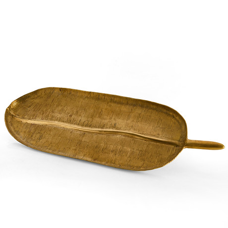 BRICKA, i form av löv. mässing, stämpelmärkt R.O.O.M., 1900/2000-tal. på auktion hos Crafoord Auktioner Stockholm