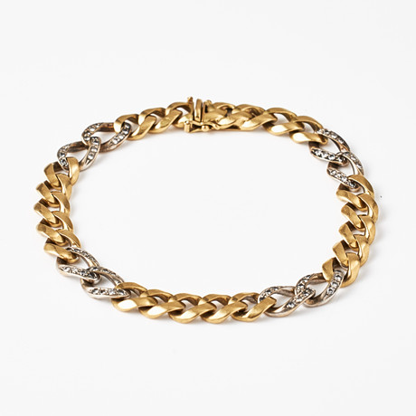 ARMBAND, 18 k guld, manglad pansarlänk, 8 länkdelar med dekor av 67 småbriljanter, Milano/Italien, (efter 1968 på auktion hos Stockholms Auktionsverk Magasin 5