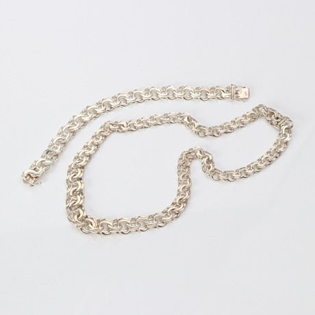 HALS- OCH ARMBAND. Sterlingsilver, bismarcklänkar, totalvikt ca 103,4 gram. på auktion hos Skånes Auktionsverk